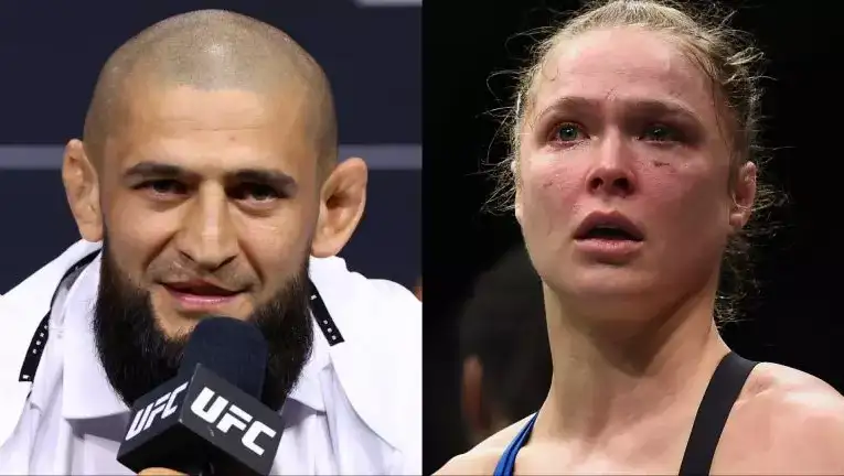Split-screen of two UFC fighters: left is a bearded man with a shaved head speaking into a mic at a press event; right is a female fighter with a bruised face in athletic gear.