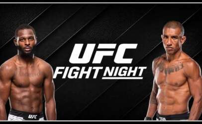 Two shirtless male UFC fighters stand on either side of a bold 'UFC Fight Night' poster.