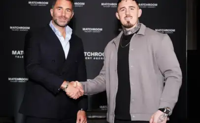 Two men shake hands at a media event in front of a black backdrop that reads MATCHROOM.