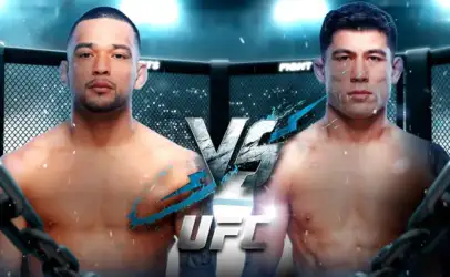 Two shirtless male fighters face off inside a UFC octagon, with a bold VS logo between them and arena lights above.