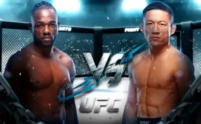 Two muscular male fighters face off inside an octagonal cage, promo banner with 'VS' and UFC branding behind them.