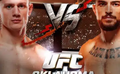 Two shirtless male MMA fighters face off inside a fenced octagon with 'UFC OKLAHOMA CITY' text.