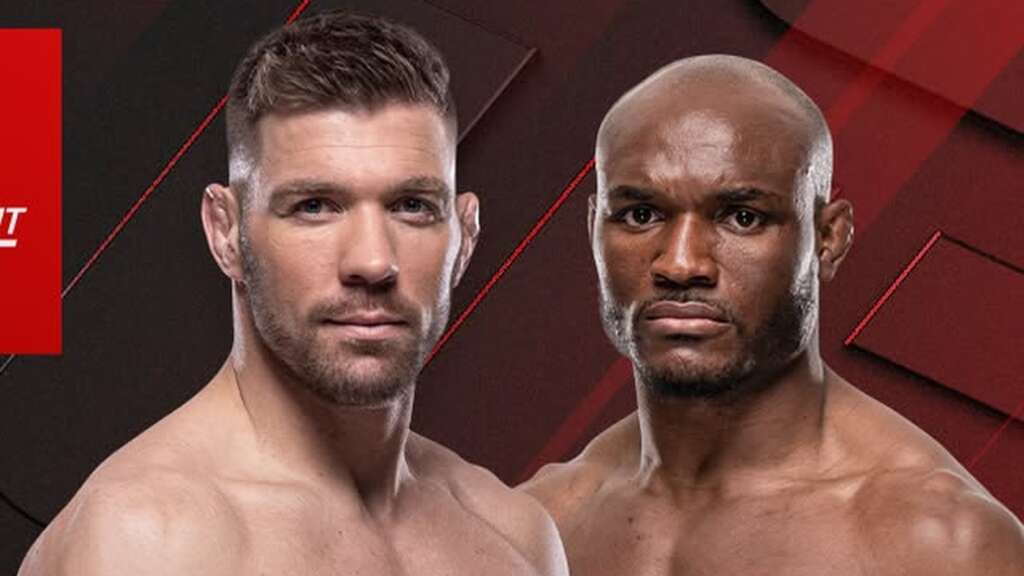 Two muscular men shirtless, facing the camera, standing side by side against a red geometric backdrop, ready for a fight.