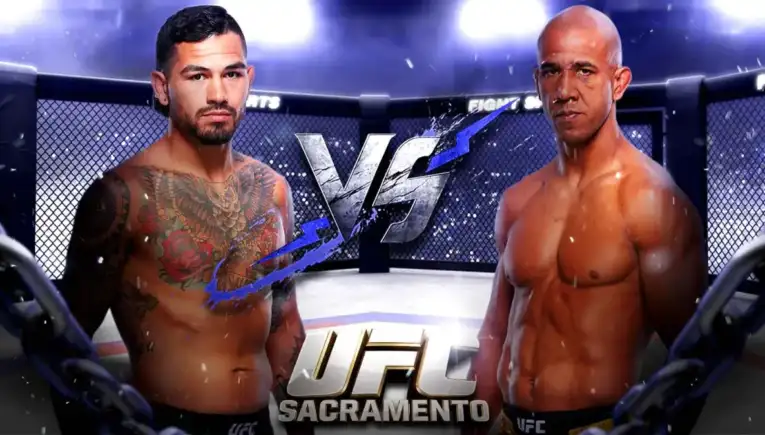 Two shirtless UFC fighters face off inside a cage for a Sacramento bout, with a bold VS in the center and 'UFC Sacramento' at the bottom