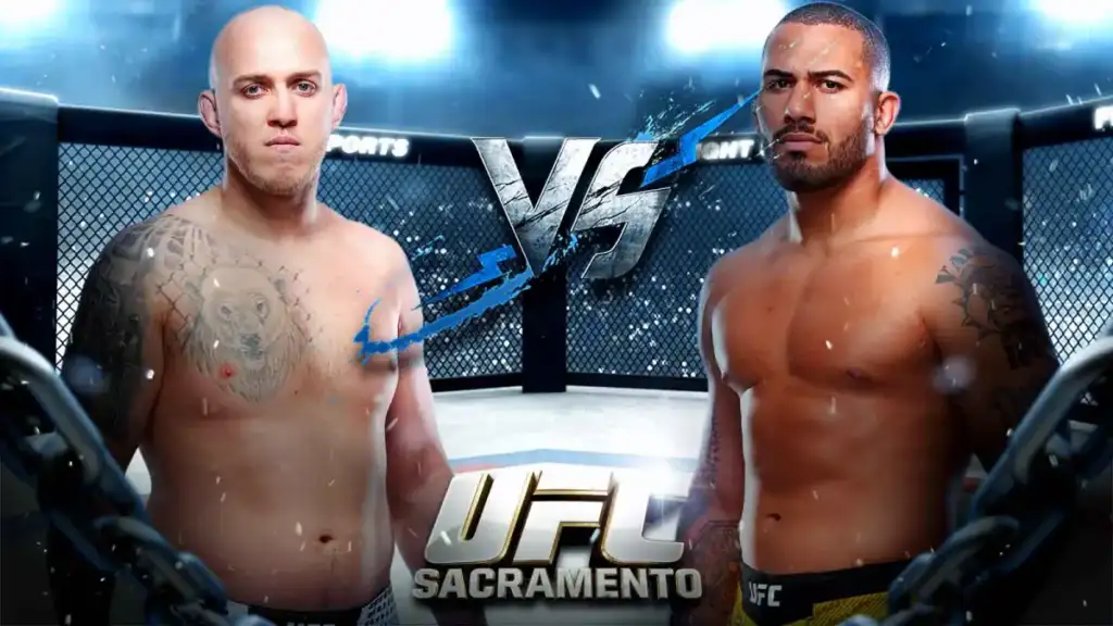 Two shirtless male UFC fighters stand facing each other inside a fenced octagon, with a prominent VS graphic and the 'UFC Sacramento' logo in the foreground.