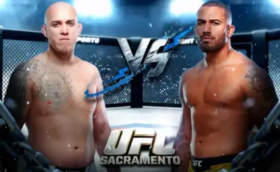 Two shirtless male UFC fighters stand facing each other inside a fenced octagon, with a prominent VS graphic and the 'UFC Sacramento' logo in the foreground.